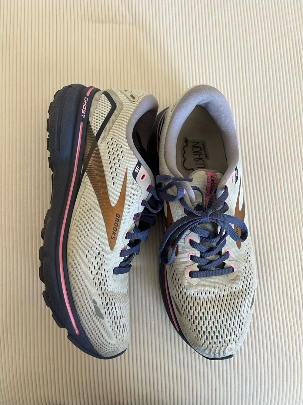 Brooks running shoes in gray with navy and pink accents